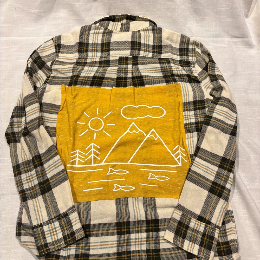 One of a kind flannel with outdoor themed patch!
